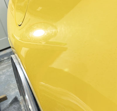 Paintwork showing dull, swirled paint before receiving a paint enhancement detail